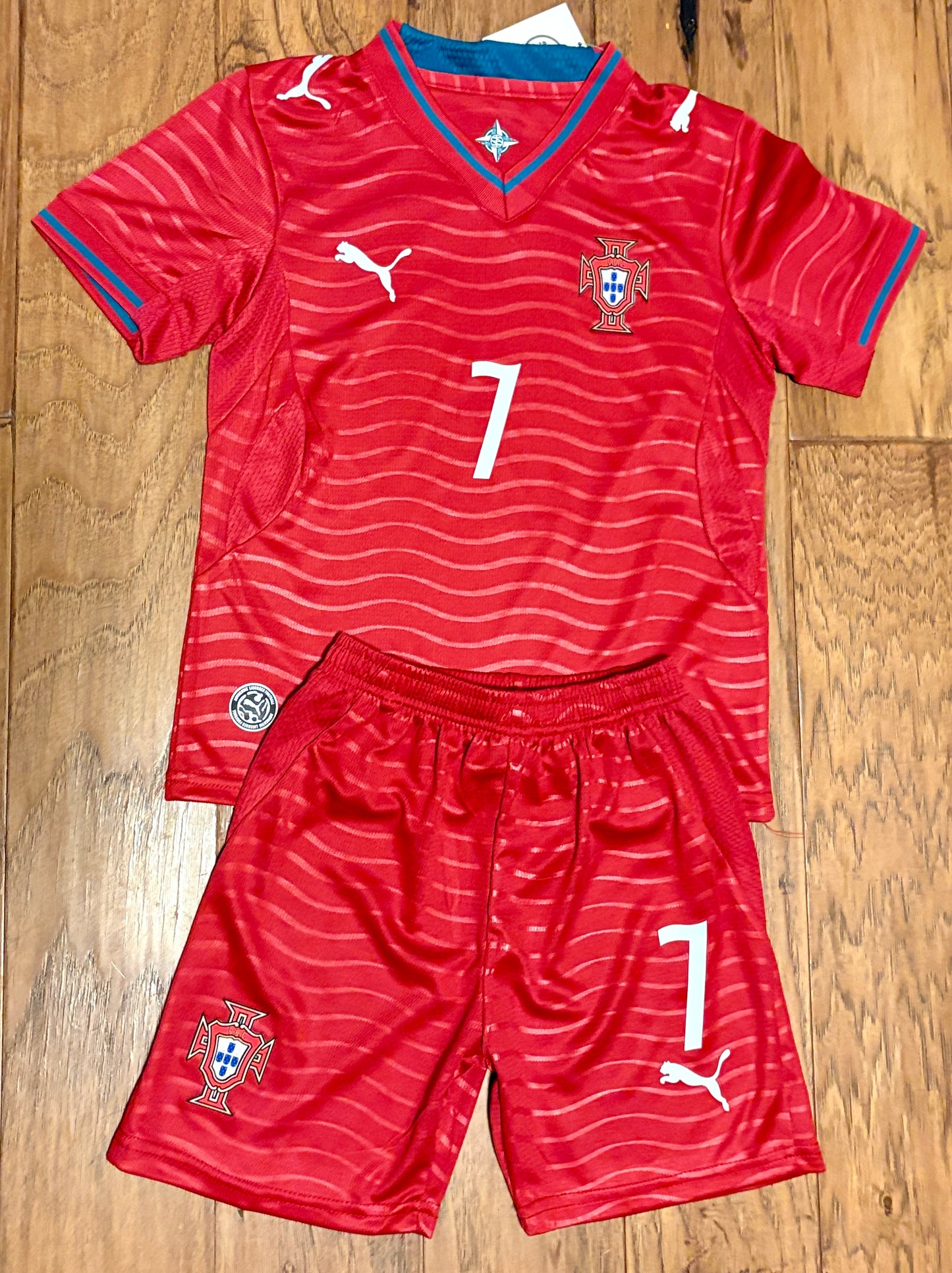 Portugal Ronaldo red home youth soccer jersey kit, two-piece set. 22 XS, 24 Small, 26 Medium, 28 Large. 